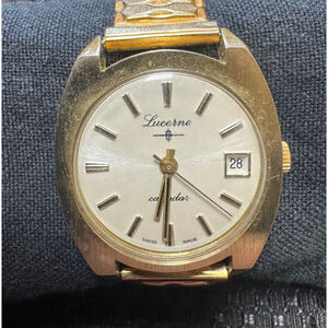 Lucerne Gold Tone Calendar Watch - Men’s - Running